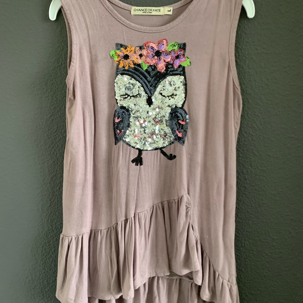 Tank top with a cute skirt on the bottom making for a beautiful dress top